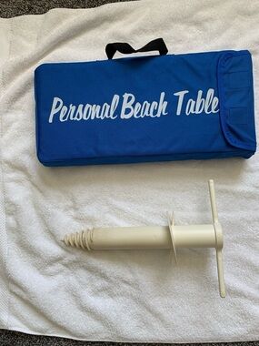 Beach table with Carry Case with White Anchor Umbrella Spike. Sold as a set.